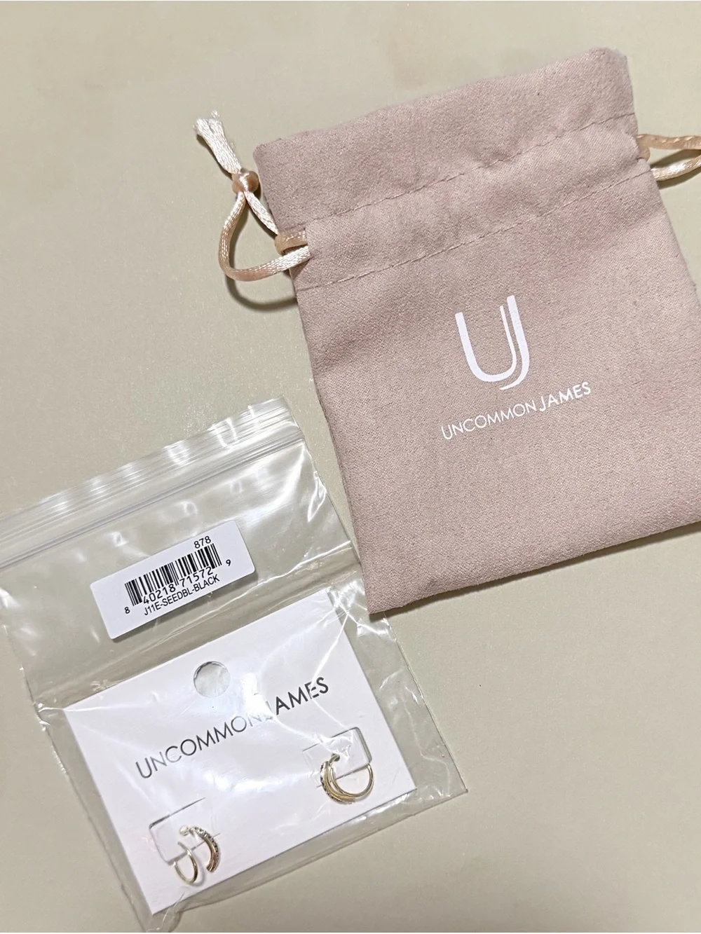 NWT Uncommon James, Seeing Double Spiral Hoop Gold Earrings with Black CZ Stones